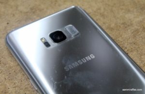 Fingerprint button next to camera